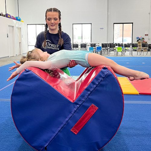 Gymnastics class for preschoolers helps young gymnast learn skills for back handsprings